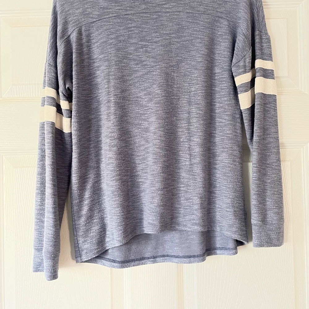 Blue long sleeve shirt with stripes on sleeves